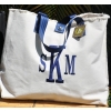 natural lg cole with navy & Caroling font; matching Makeup bag
