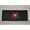 Black felt with coral/turq brooch